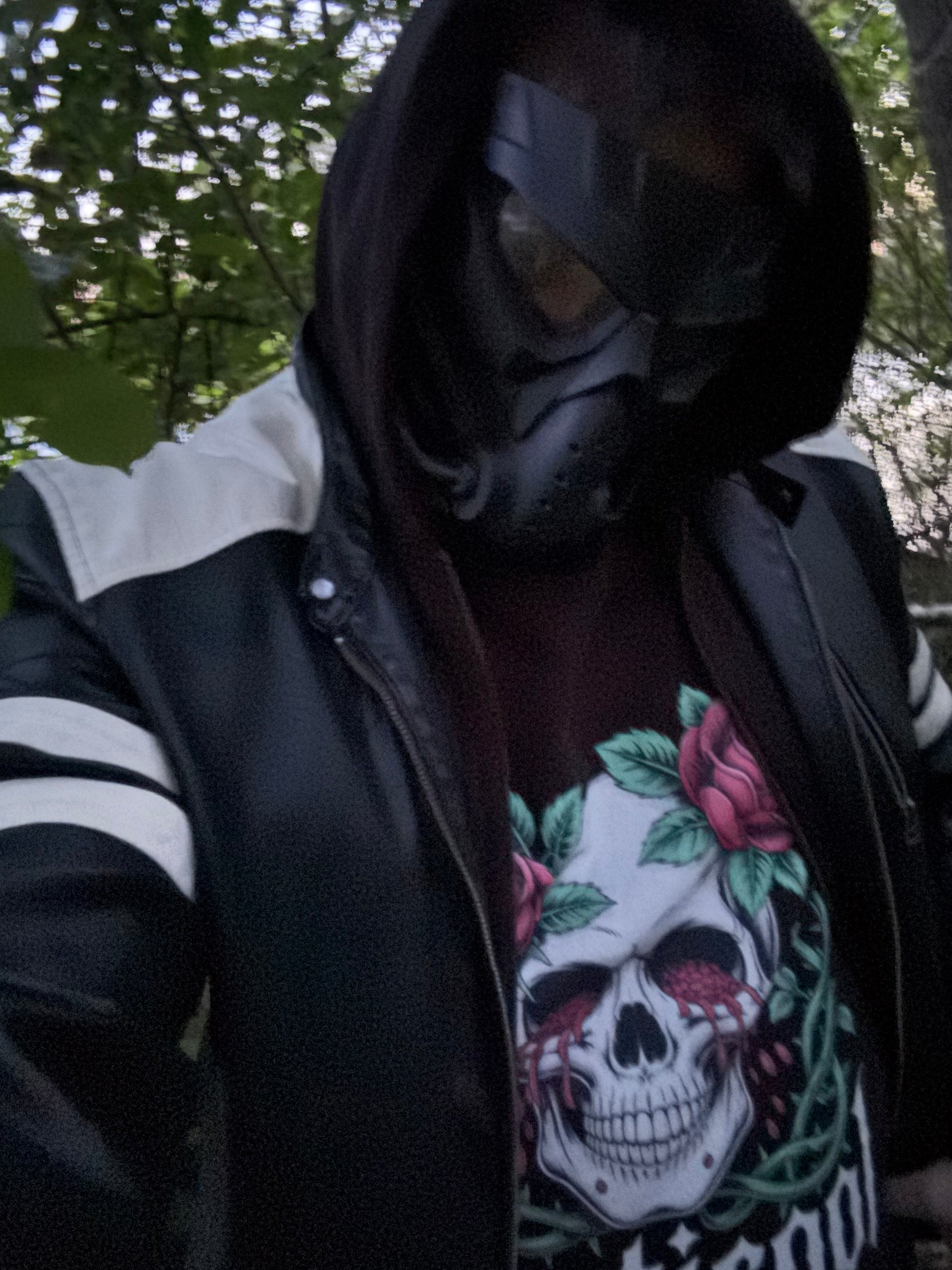 Exoticool-System-Glitch-Alien-Streetwear-Tee-Masked-Figure-Forest-Close-Up-Dark

