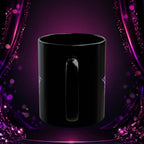Back view of the glossy black Deseraè Stephens Janaè Purple Reign Glamour Mug against a purple sparkling backdrop