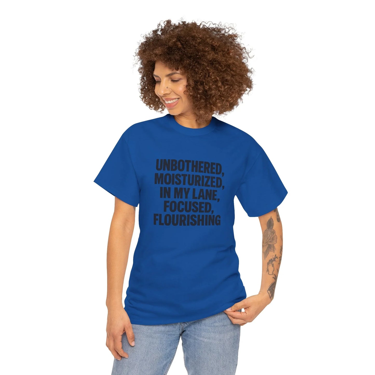 Woman in blue graphic t-shirt with motivational quote, casual fashion style