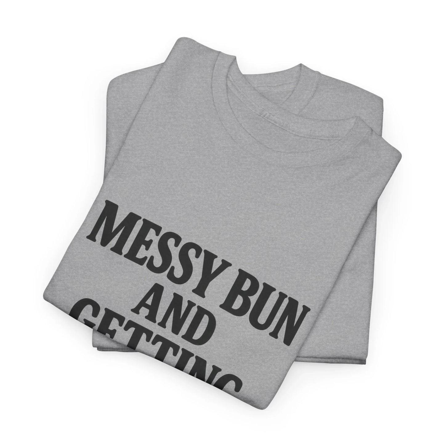 Folded gray graphic t-shirt with black text saying 'MESSY BUN AND' on a white background