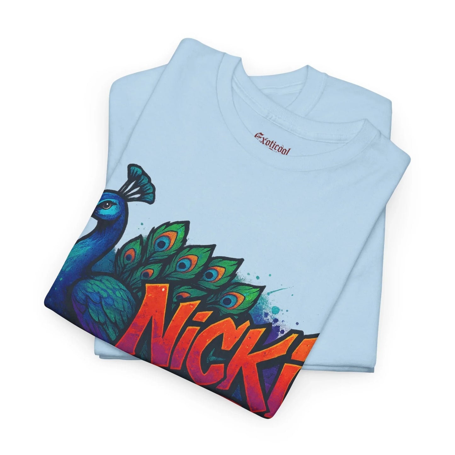 Light blue t-shirt with colorful peacock and bold Nicki text graphic design