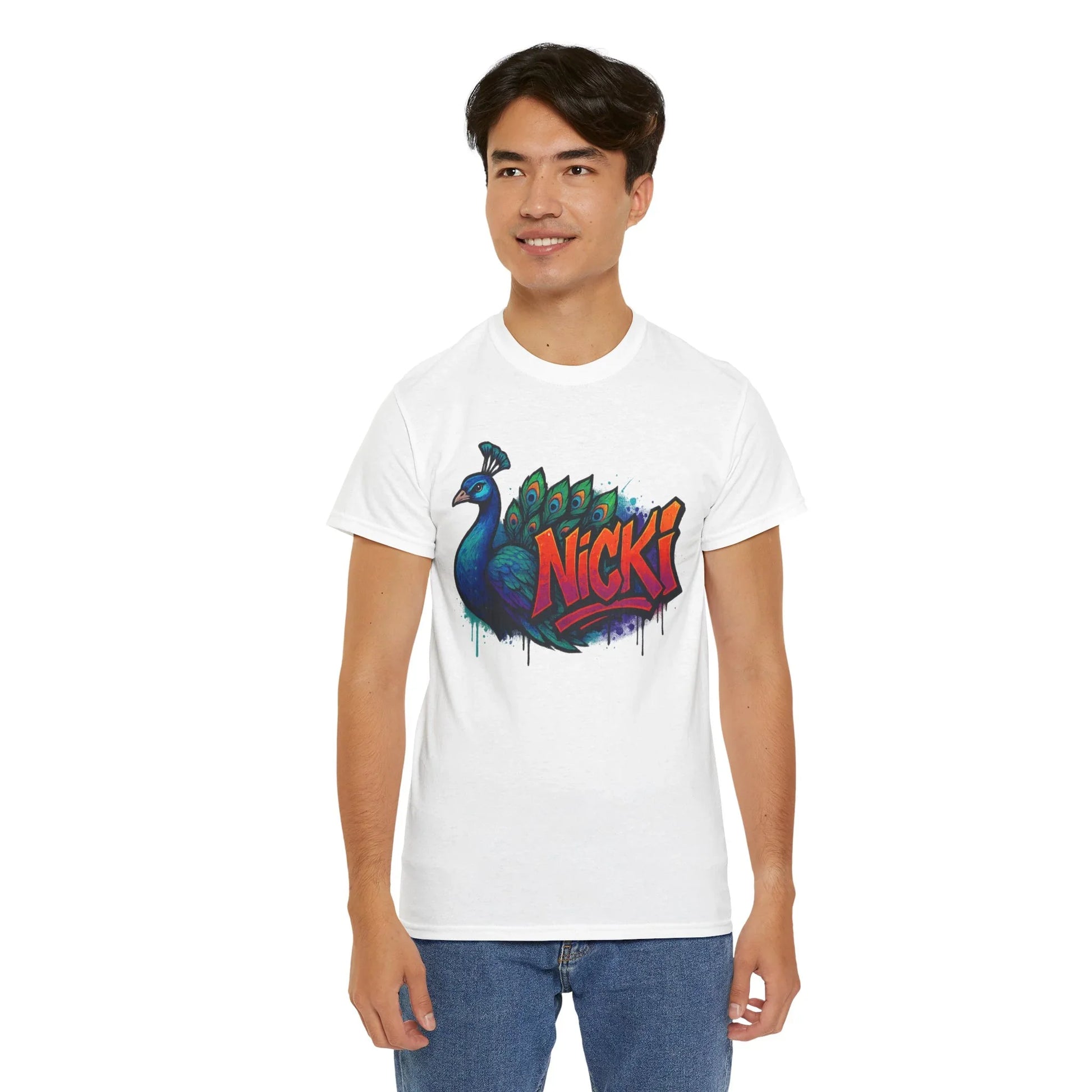 Man wearing white graphic tee with colorful peacock and 'Nicki' text design