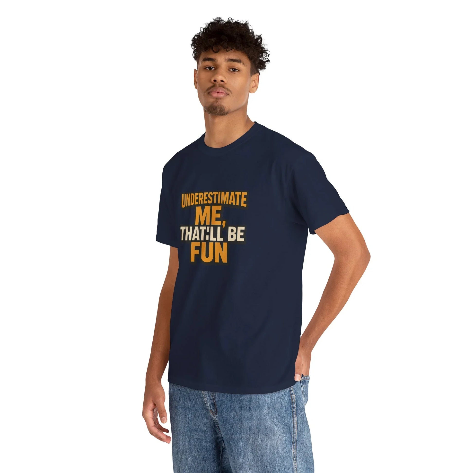 Man wearing navy blue graphic t-shirt with yellow 'Underestimate me, that'll be fun' text