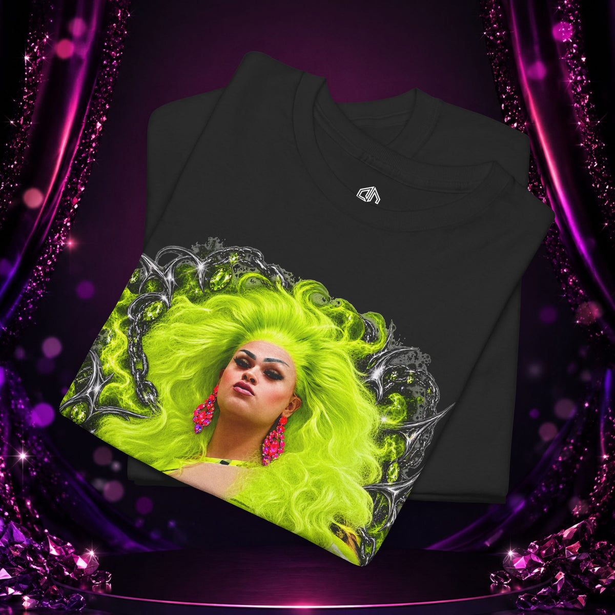 Folded black Deseraè Stephens Janaè Neon Majesty Portrait Tee showing the neon green portrait artwork and Exoticool neck branding