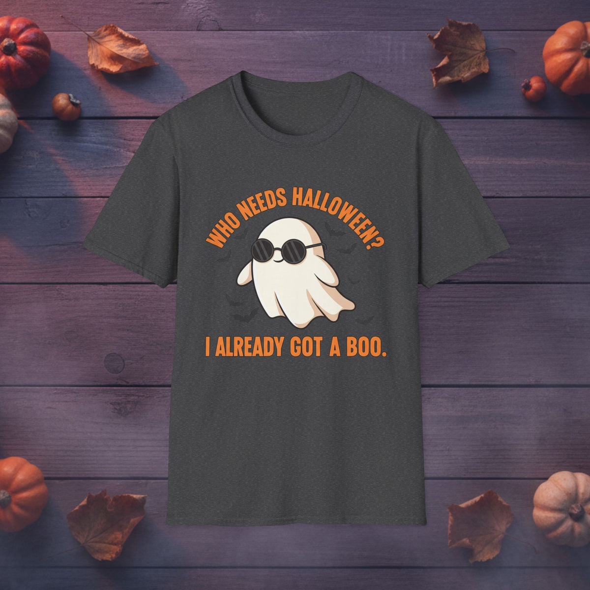 Who Needs Halloween? I Already Got a Boo Halloween tee in black, front view on dark wood background
