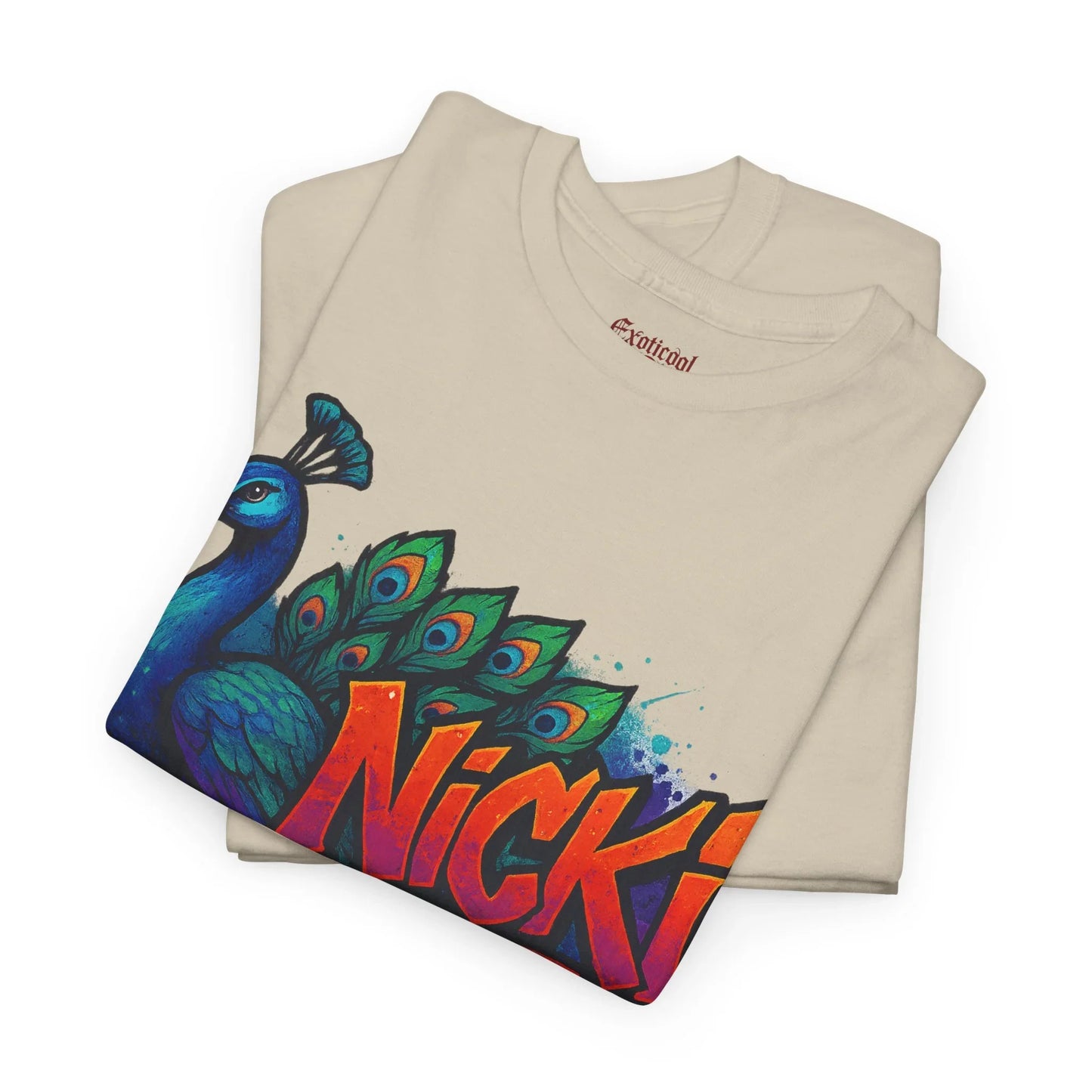 Beige t-shirt with colorful peacock and bold Nicki text graphic design