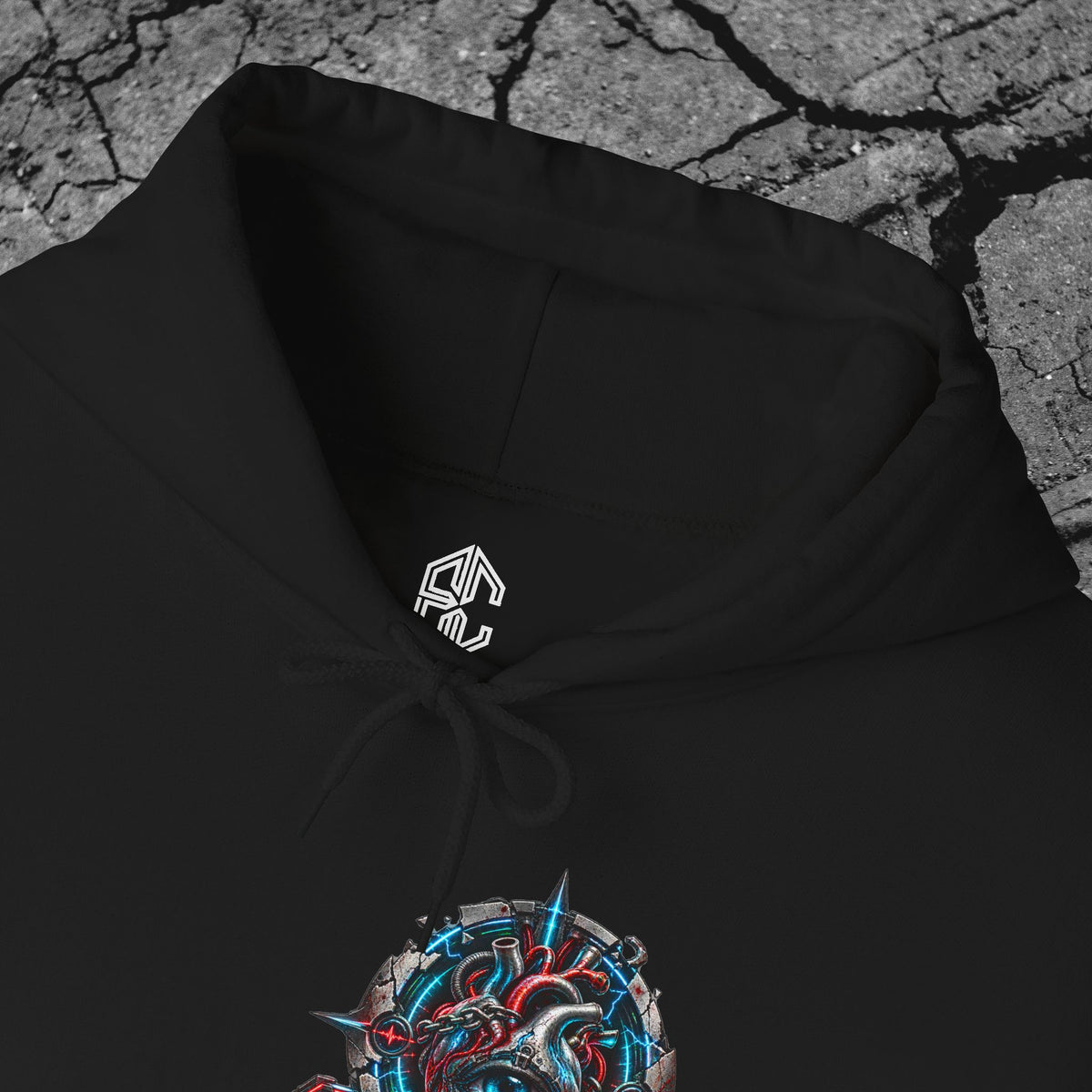Close-up of the You Cannot License a Soul hoodie collar, Exoticool inner label and detailed biomechanical chest print