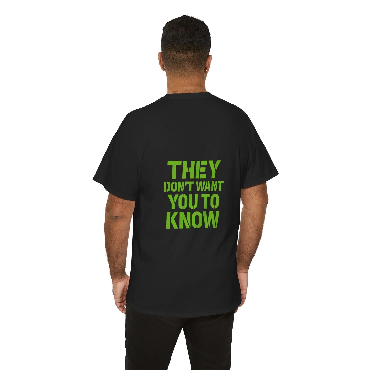 Man wearing black t-shirt with green 'They Don't Want You To Know' text on back