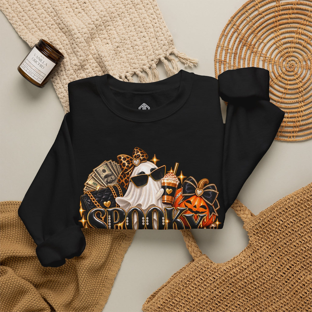Spooky Rich in Training black crewneck sweatshirt styled flat with autumn accessories