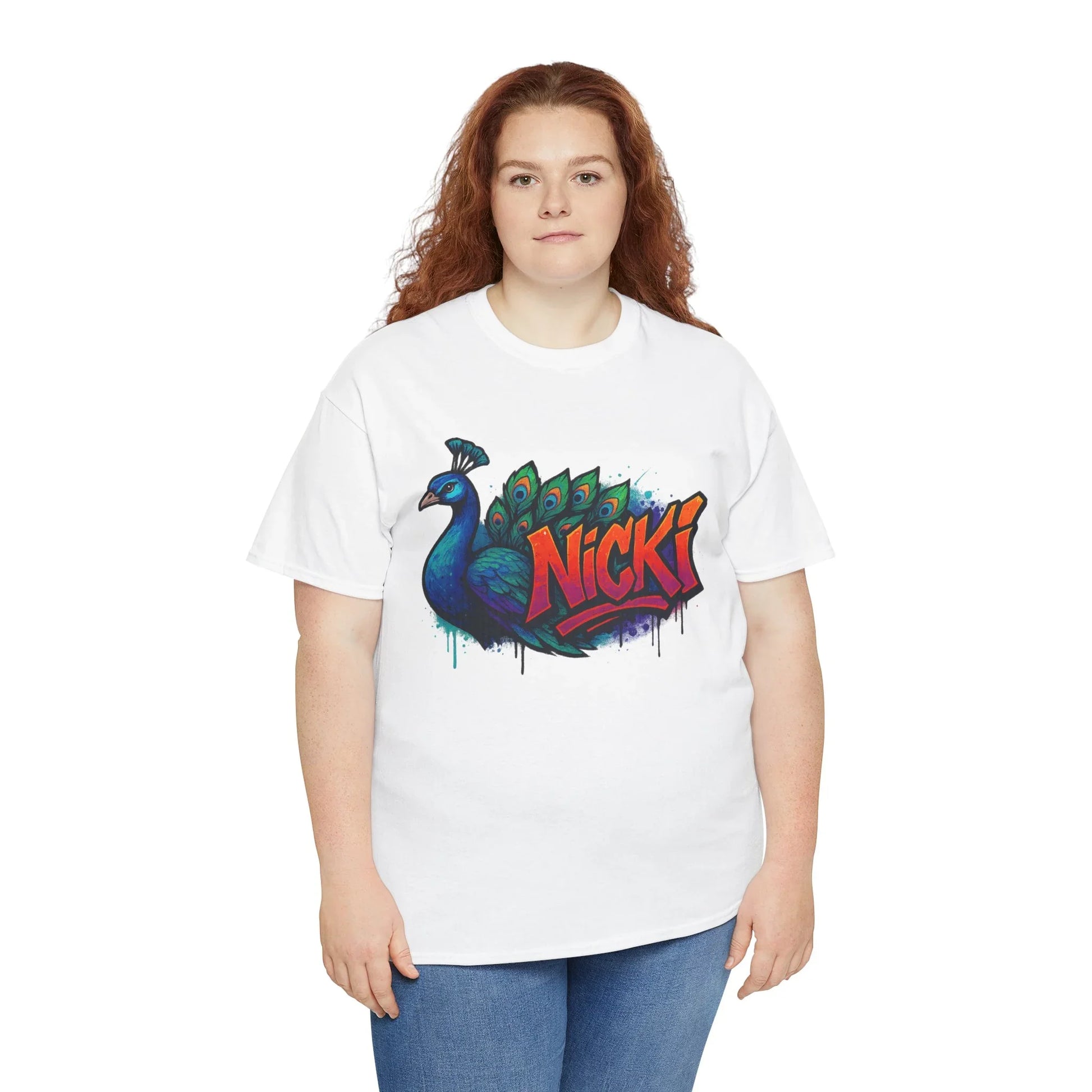 Woman wearing white t-shirt with colorful peacock and 'Nicki' graffiti text design