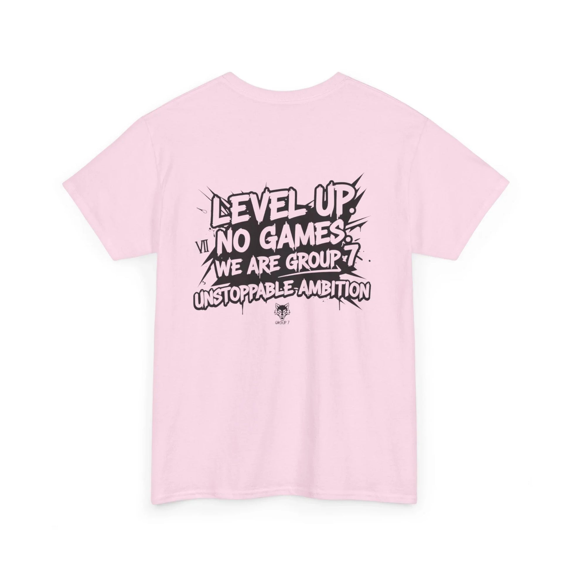 Pink t-shirt with bold black graphic text 'LEVEL UP NO GAMES WE ARE GROUP 7 UNSTOPPABLE AMBITION'