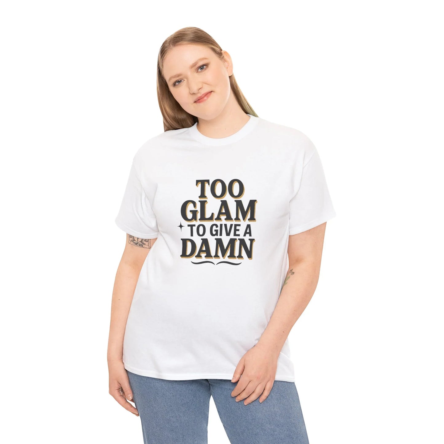 Smiling woman wearing white graphic t-shirt with 'Too glam to give a damn' text, casual style