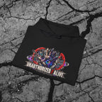 Folded black cyberpunk graphic hoodie showing the vivid front artwork and heavyweight fabric against a concrete background