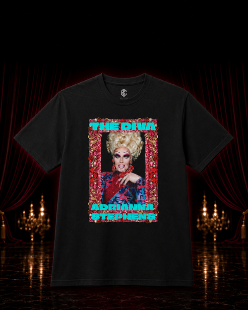 Black Adrianna Stephens limited-edition graphic tee displayed before red curtains and chandeliers.
