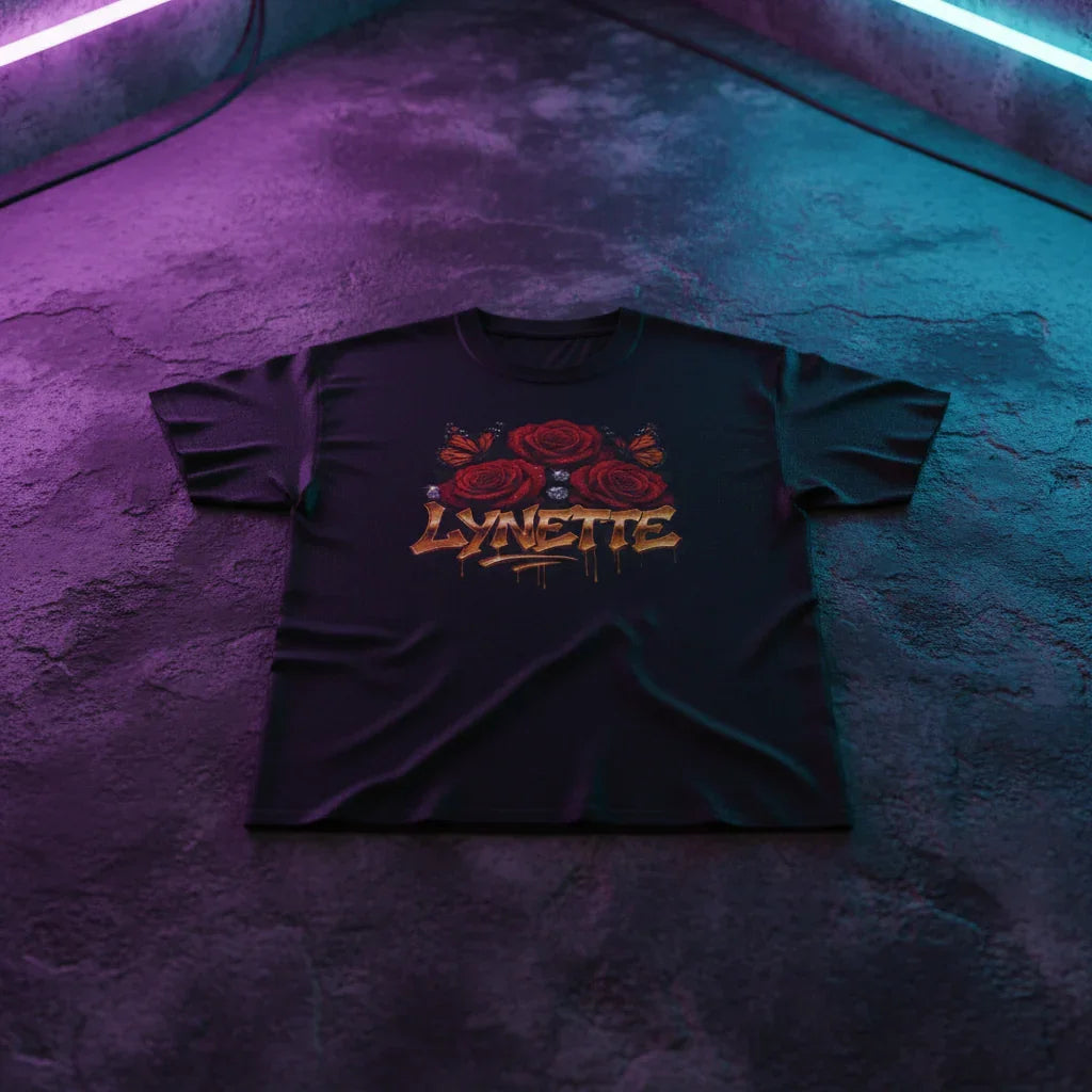 Black Lynette t-shirt with rose and butterfly graphic in neon-lit room, streetwear fashion