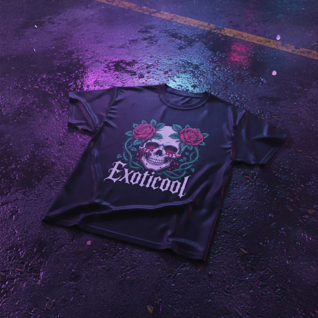 Black Exoticool t-shirt with skull and rose graphic on wet, neon-lit pavement