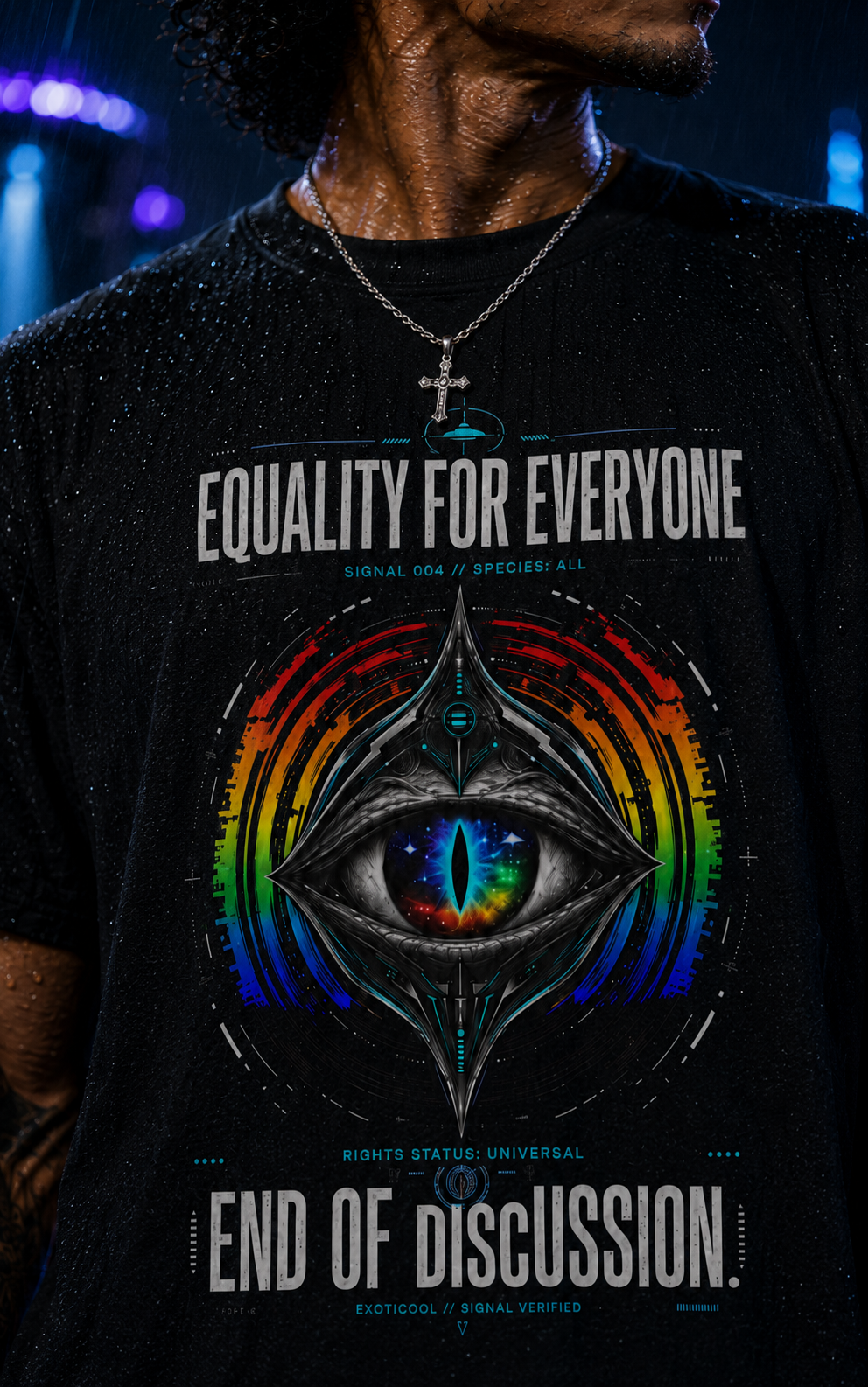 Close-up of the Equality for Everyone alien-eye graphic T-shirt worn in neon rain.