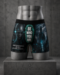 Front view of black alien boxer briefs with Be Who You Are artwork and a futuristic city.