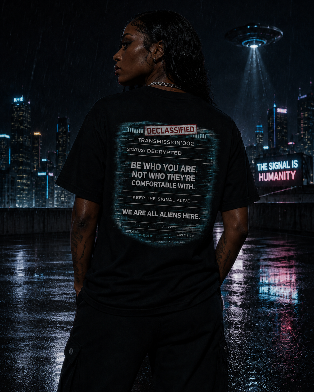Back view of the alien graphic tee showing Be Who You Are. Not Who They’re Comfortable With.