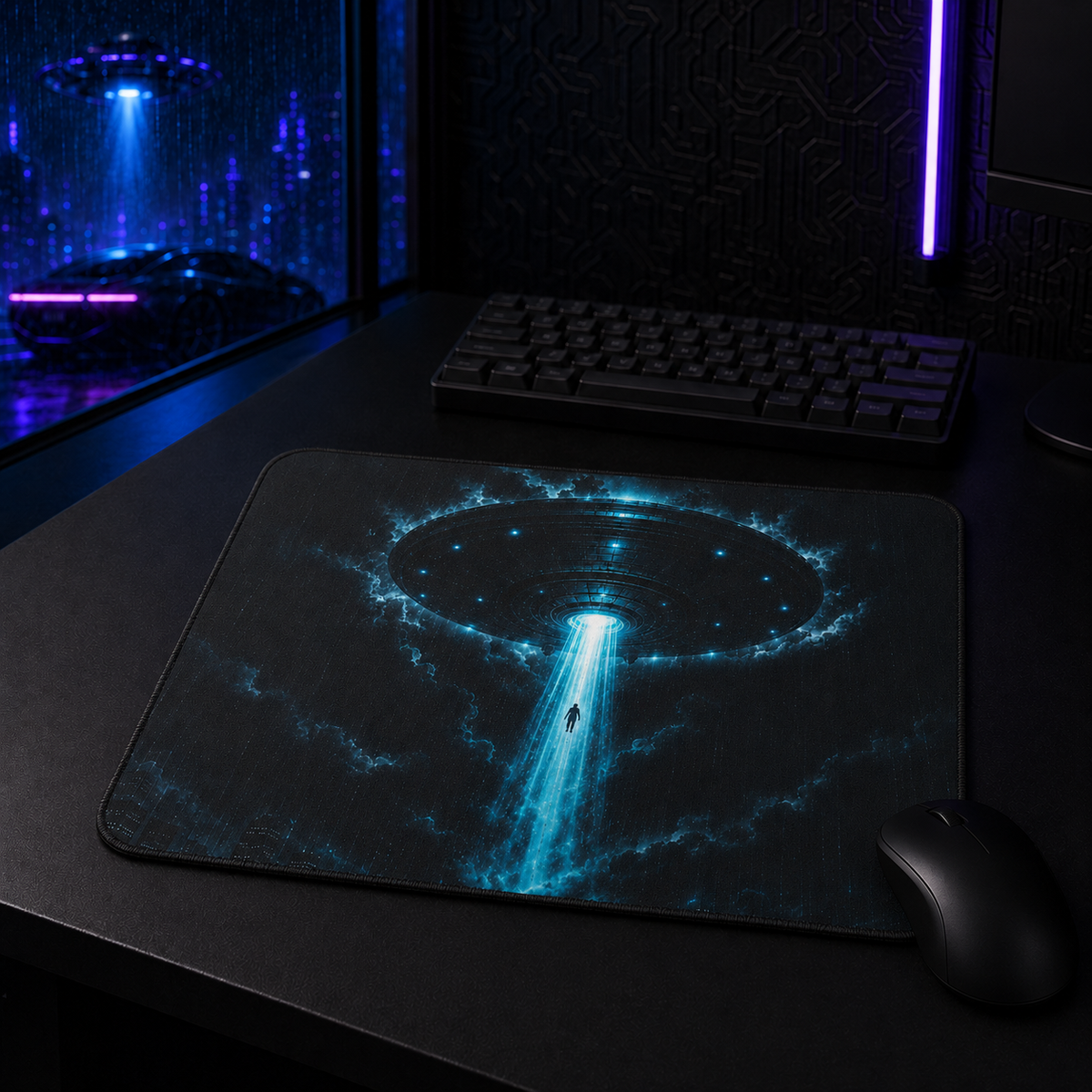 UFO Abduction mouse pad displayed with a black mouse and keyboard in a futuristic gaming workstation.

