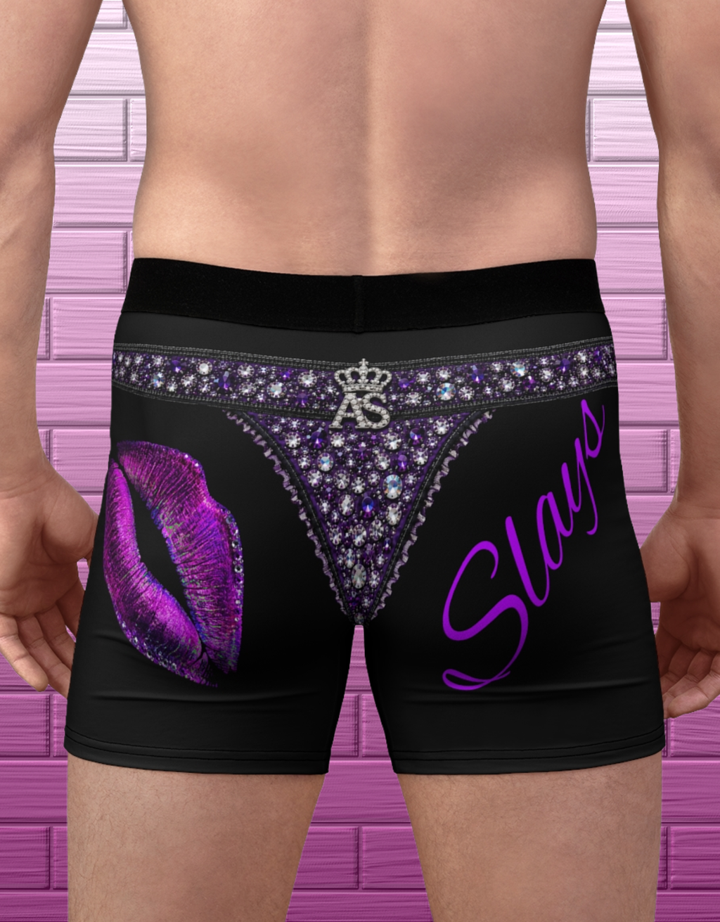 Adult model wearing black drag glam boxer briefs with rhinestone thong illusion, purple lips and Slay back graphic