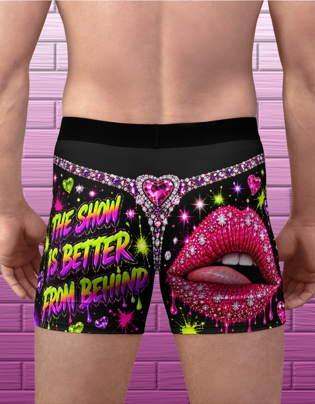 Adult model showing back of drag glam boxer briefs with rhinestone thong illusion, jeweled lips and bold neon lettering