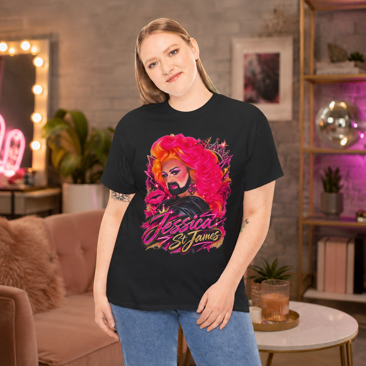 Model wearing the black Jessica St. James Glamour Portrait Tee in a warm indoor lifestyle setting