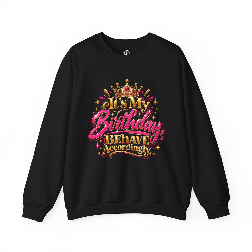 Black It’s My Birthday Behave Accordingly sweatshirt with pink and gold crown graphic