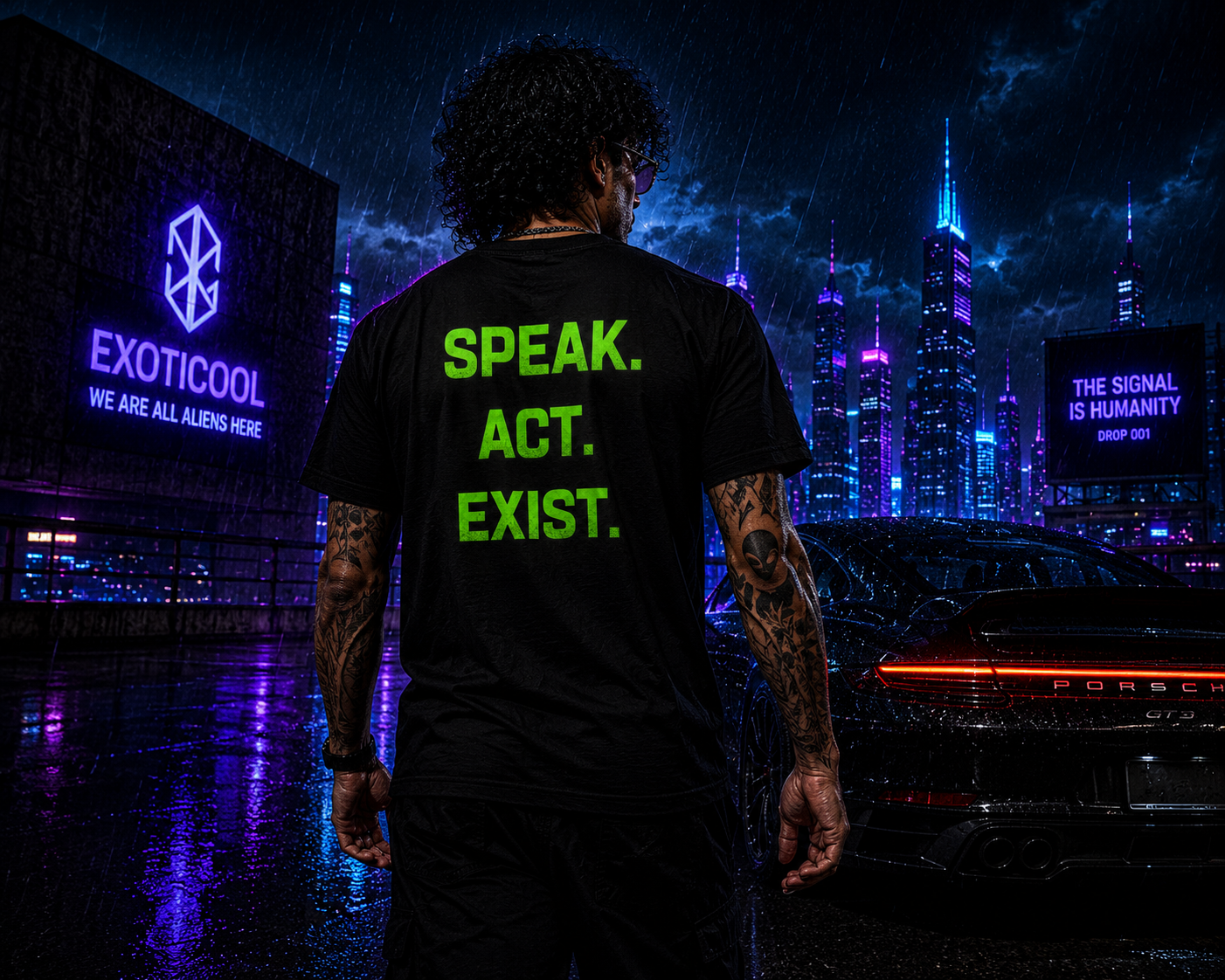 Cinematic rear view of the Exoticool Your Silence Is Complicity black T-shirt showcasing the Speak. Act. Exist. back graphic with a neon cyberpunk city skyline and black Porsche.