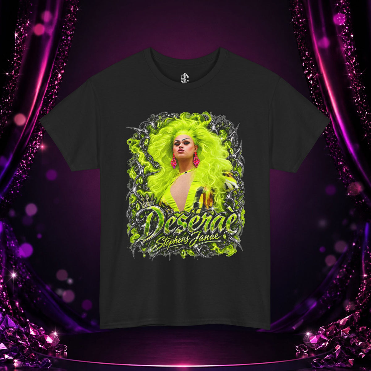 Black Deseraè Stephens Janaè Neon Majesty Portrait Tee with neon green drag artwork on a purple sparkling stage backdrop