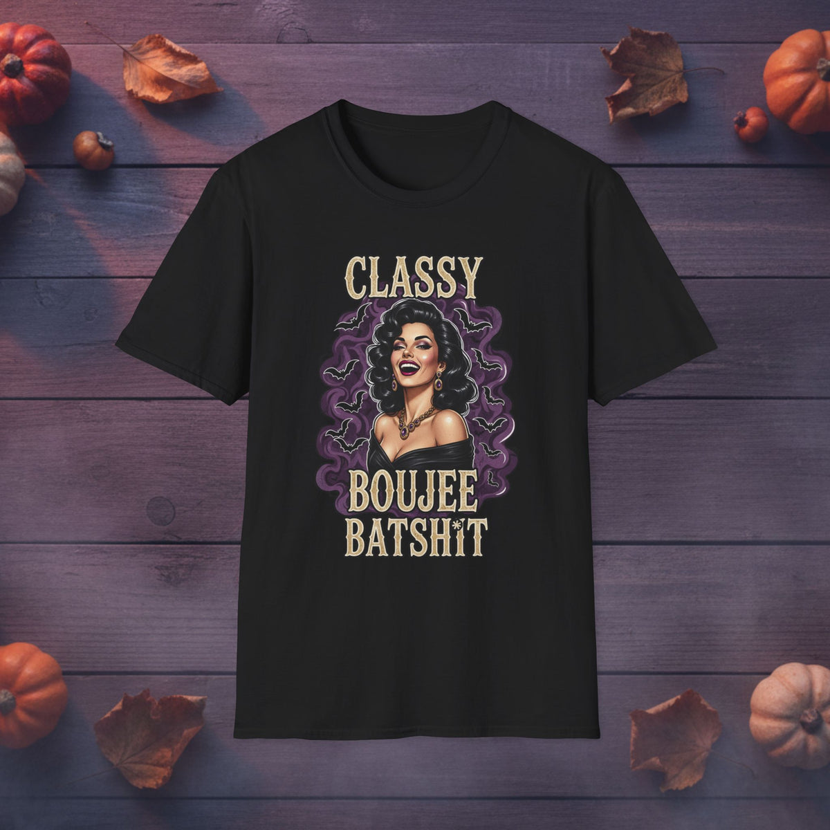 Classy Boujee Batsh*t Halloween graphic tee in black, front view on dark wood background