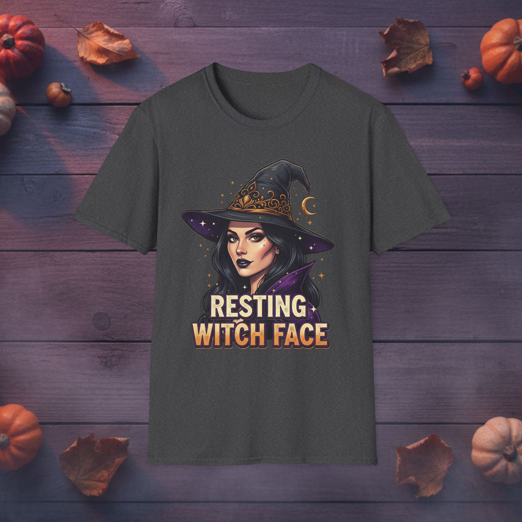 Resting Witch Face witch graphic tee in black, front view on dark wood background