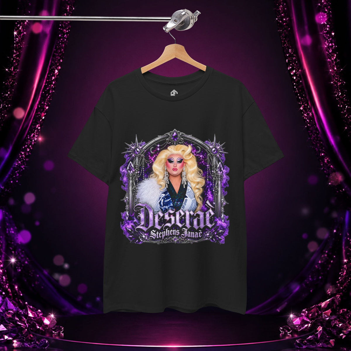 Black Deseraè Stephens Janaè Purple Reign Glamour Portrait Tee hanging against a dramatic purple and pink stage backdrop