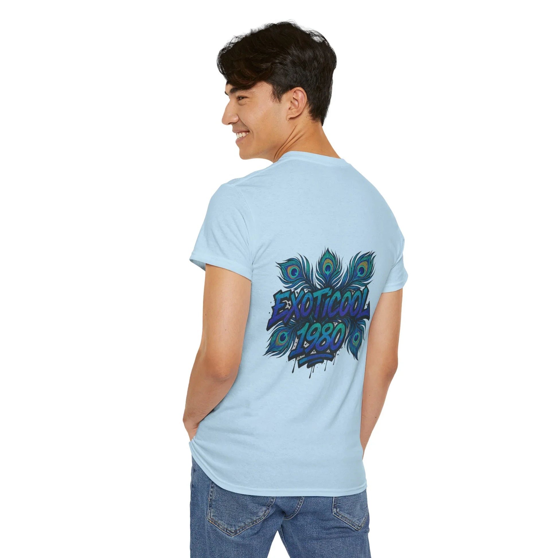 Man wearing light blue t-shirt with peacock feather graphic and EXOTICOOL 1980 text