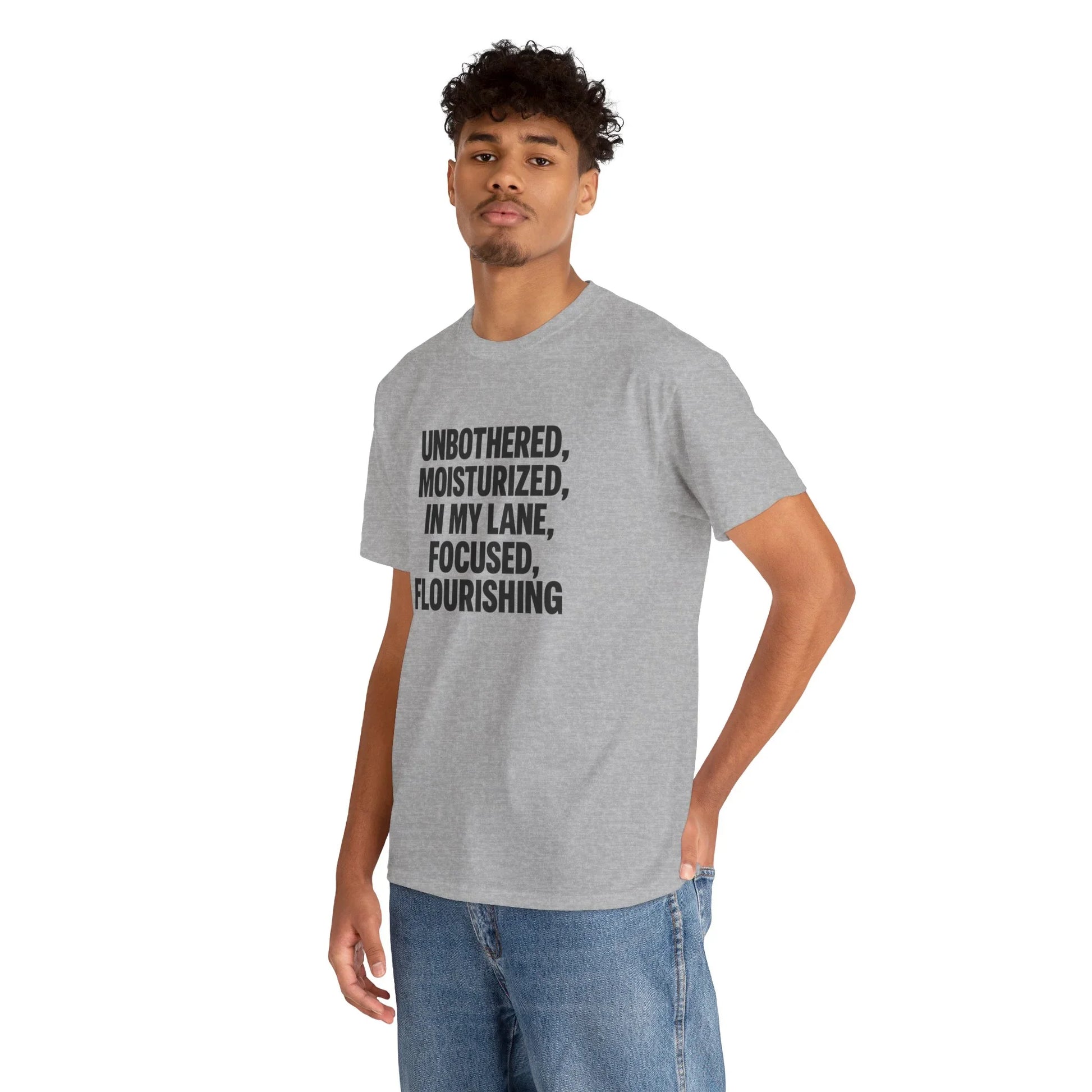 Man wearing gray graphic t-shirt with bold text, casual fashion, isolated on white background