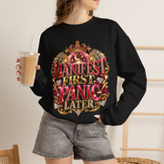 Woman wearing the Manifest First, Panic Later black crewneck sweatshirt in a casual lifestyle setting