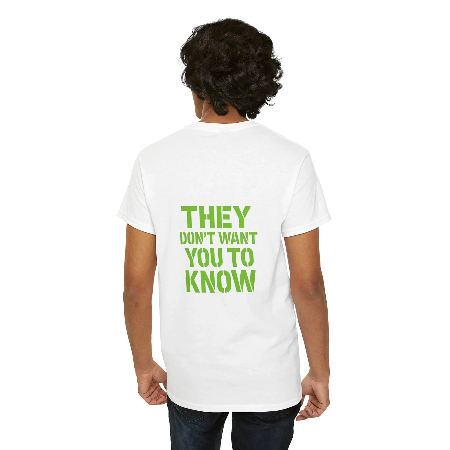 Back view of man wearing white t-shirt with green 'THEY DON'T WANT YOU TO KNOW' text