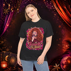 Woman wearing the Jessica St. James black heavy cotton graphic tee in a dramatic stage-inspired setting
