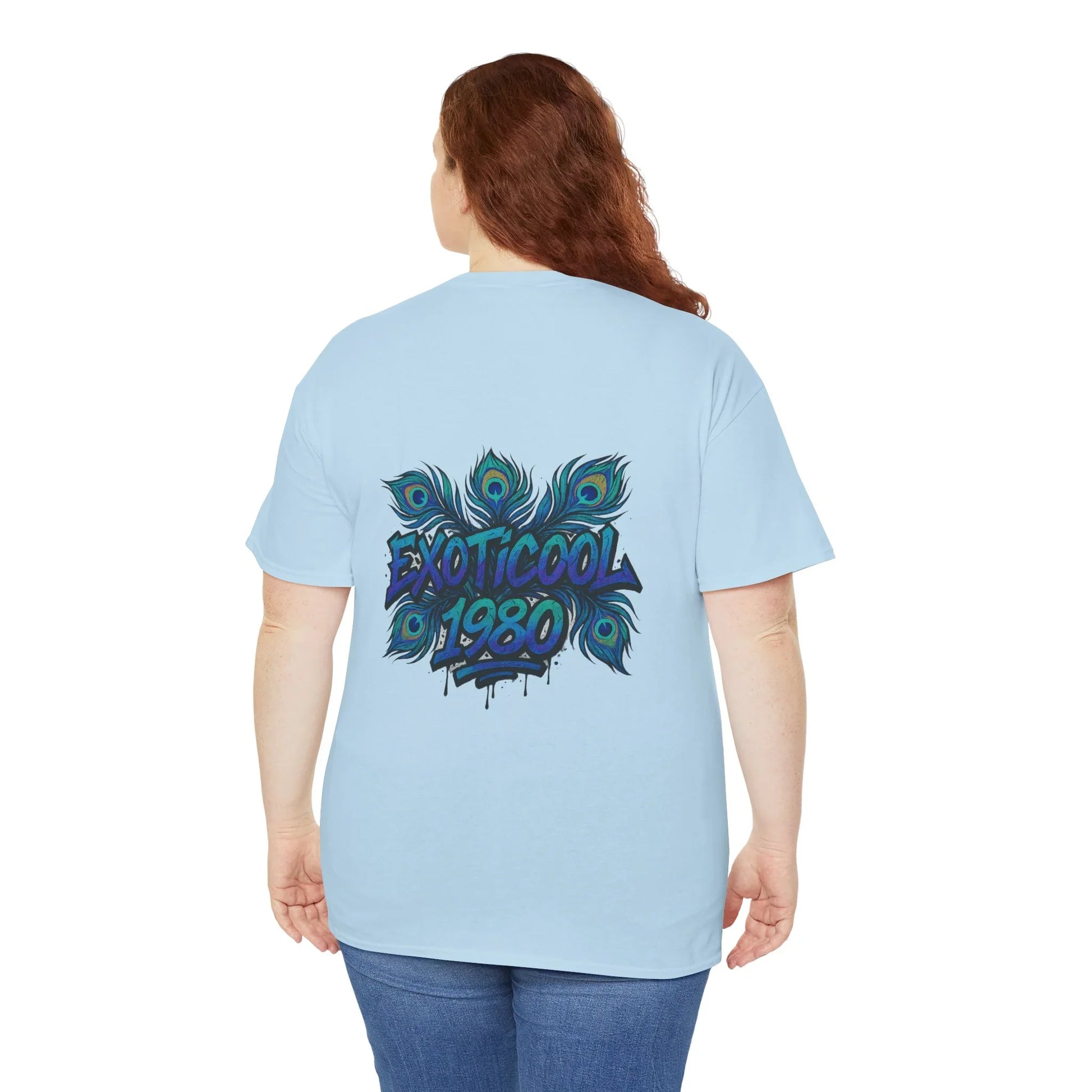 Woman wearing light blue T-shirt with EXOTICOOL 1980 and peacock feather graphic on back