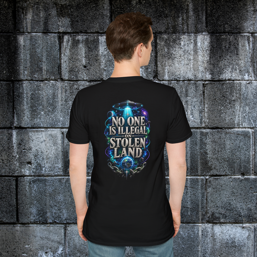 Model showing the No One Is Illegal on Stolen Land back print on a black graphic tee