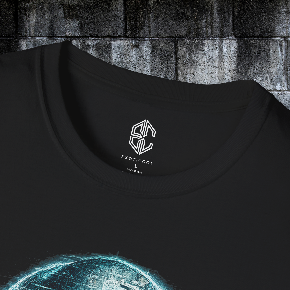 Close-up of the Exoticool printed neck label and collar on the black alien statement graphic tee