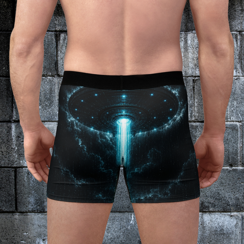 Back view of black alien abduction boxer briefs featuring the all-over extraterrestrial graphic pattern