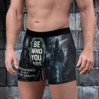 Side view of black Exoticool alien boxer briefs showing the UFO artwork and Signal Verified waistband