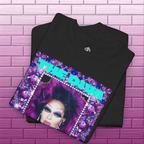 Folded black Purple Reign Diva tee showing the Adrianna Stephens portrait artwork and Exoticool neck label