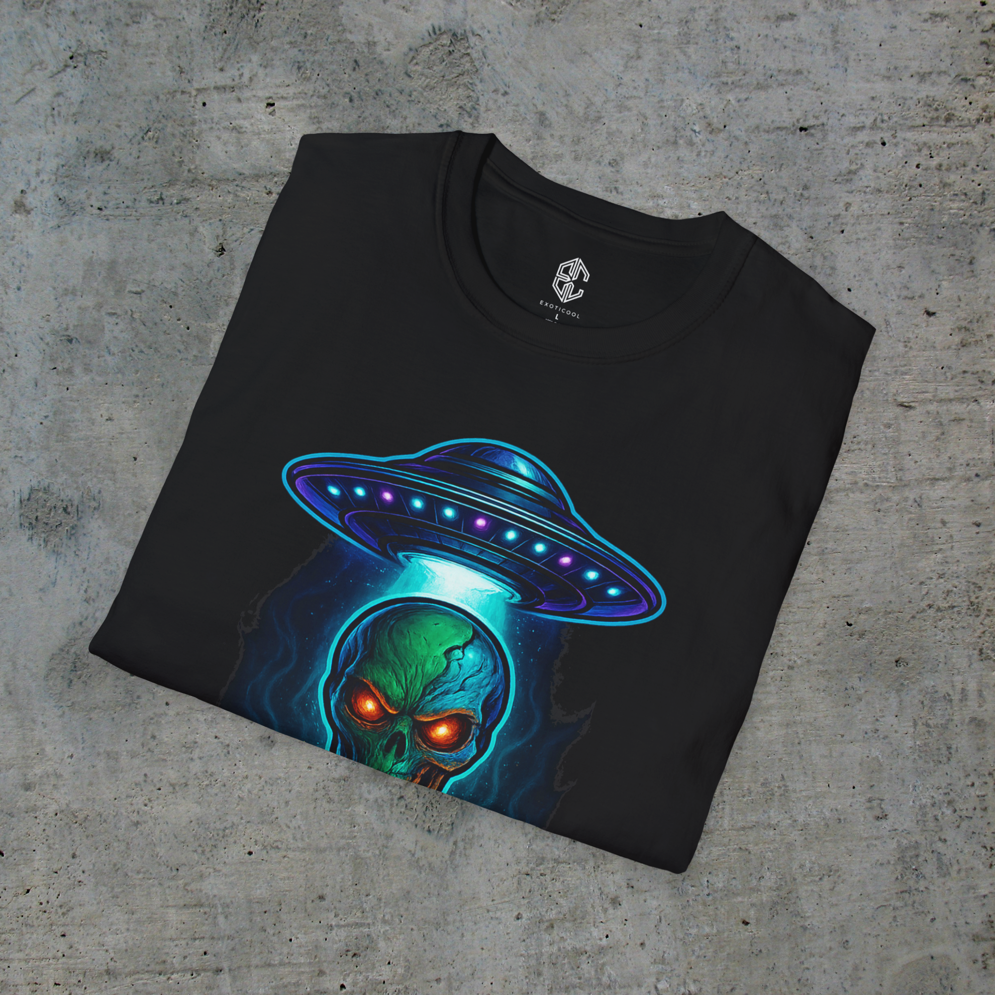 Folded black alien signal graphic tee showing the UFO artwork and Exoticool printed neck label