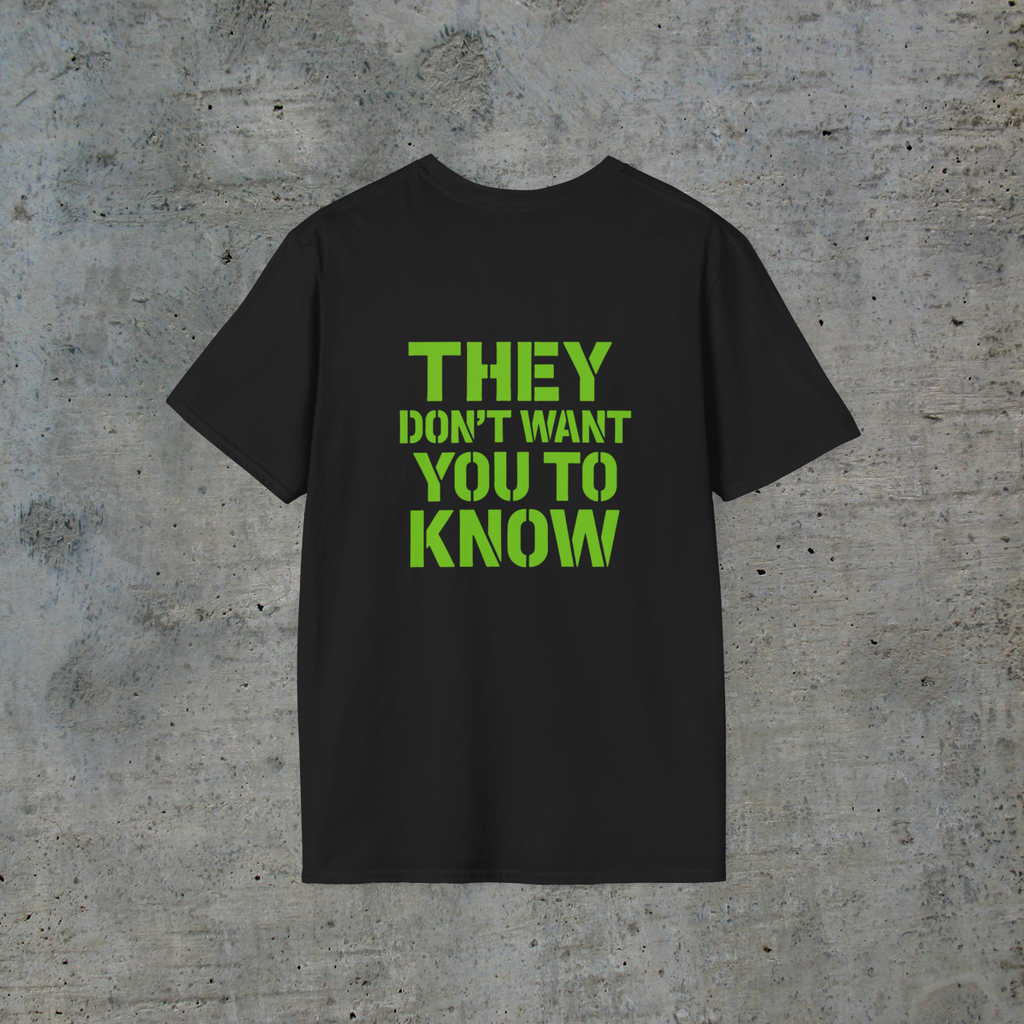 Back of black alien signal graphic tee reading They Don’t Want You to Know in neon-green lettering