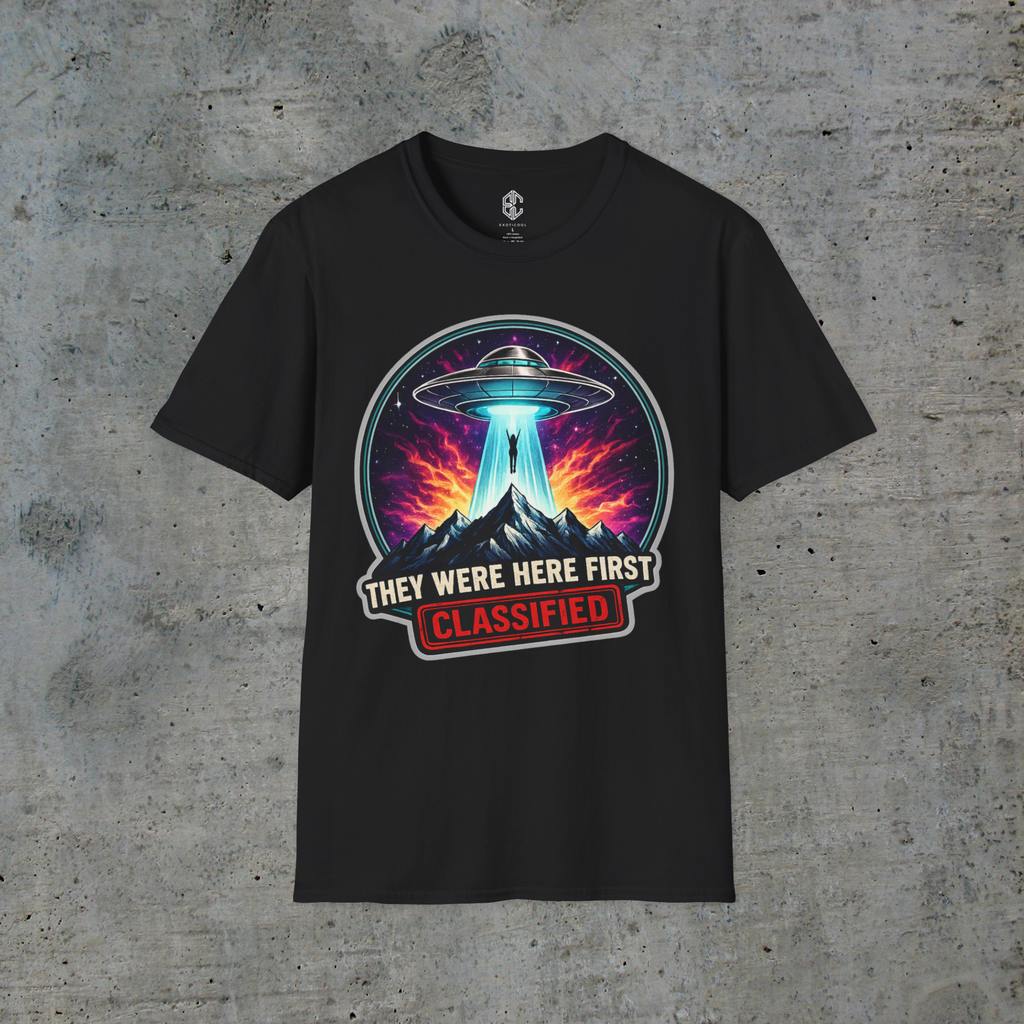 Front view of black They Were Here First alien abduction graphic tee with UFO, mountains and classified artwork