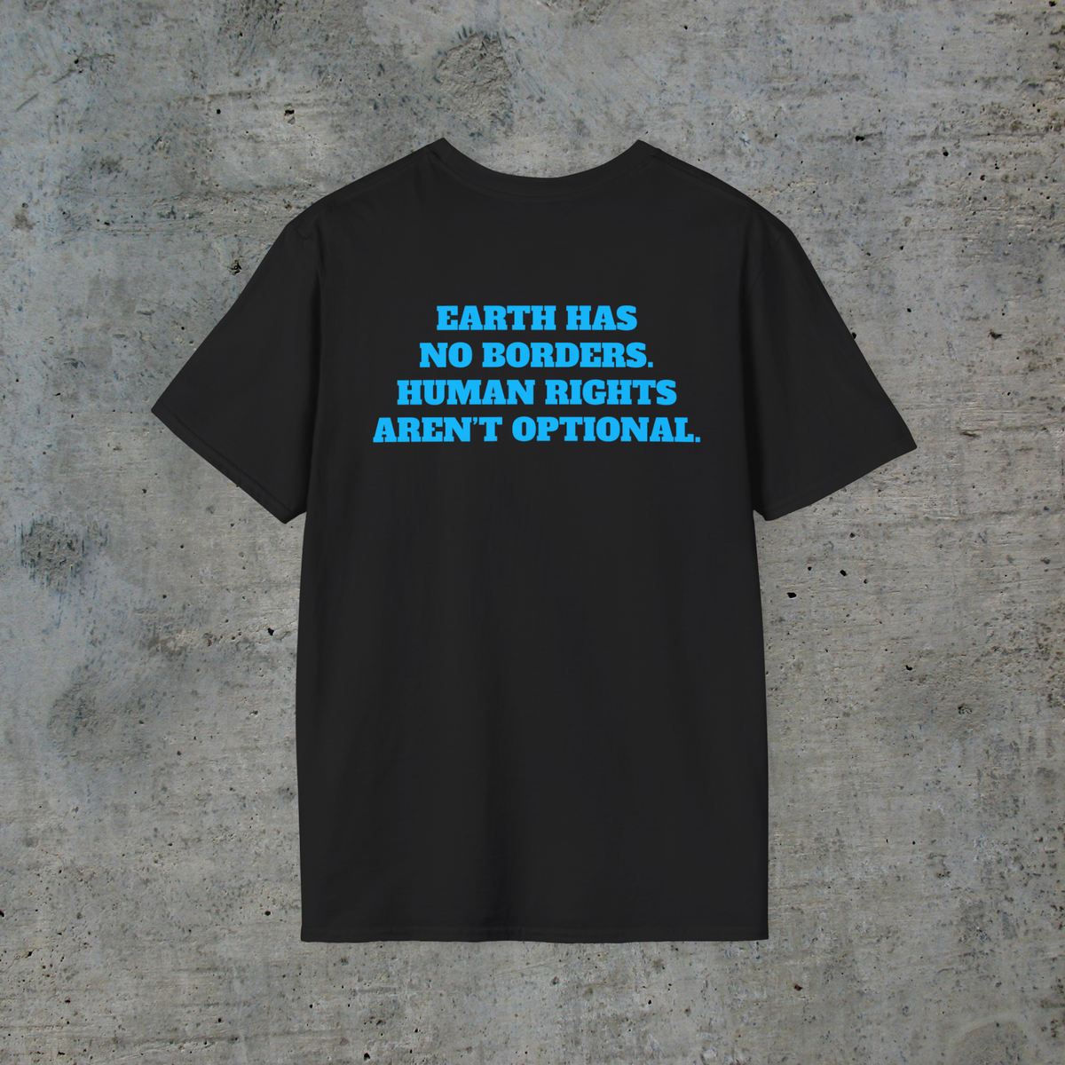 Back of black human rights graphic tee reading Earth Has No Borders Human Rights Aren’t Optional