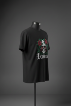 Left side view of black Exoticool System Glitch Tee on mannequin showing fit and front skull-and-roses graphic placement