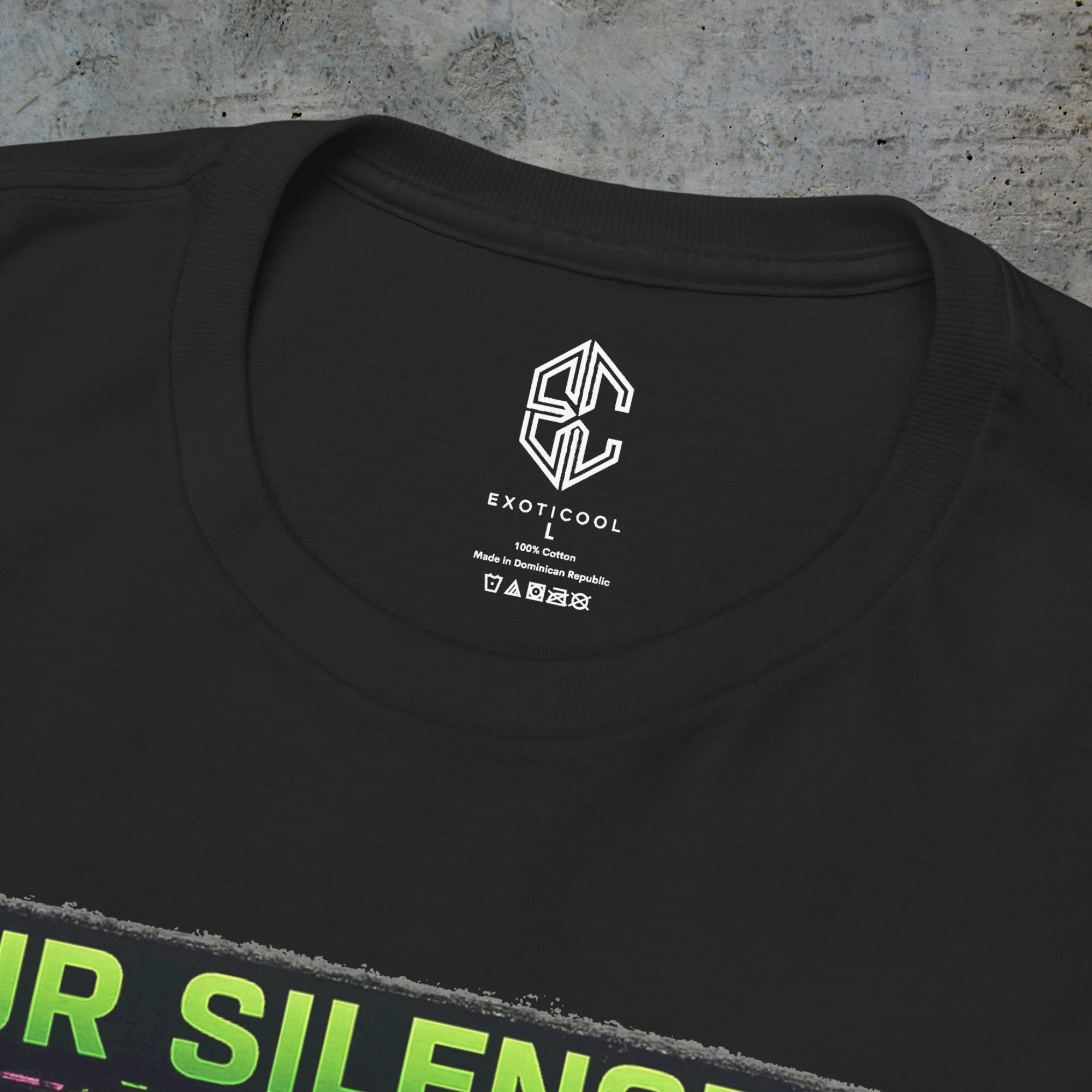 Close-up of the Exoticool printed neck label and collar on the black activist graphic tee